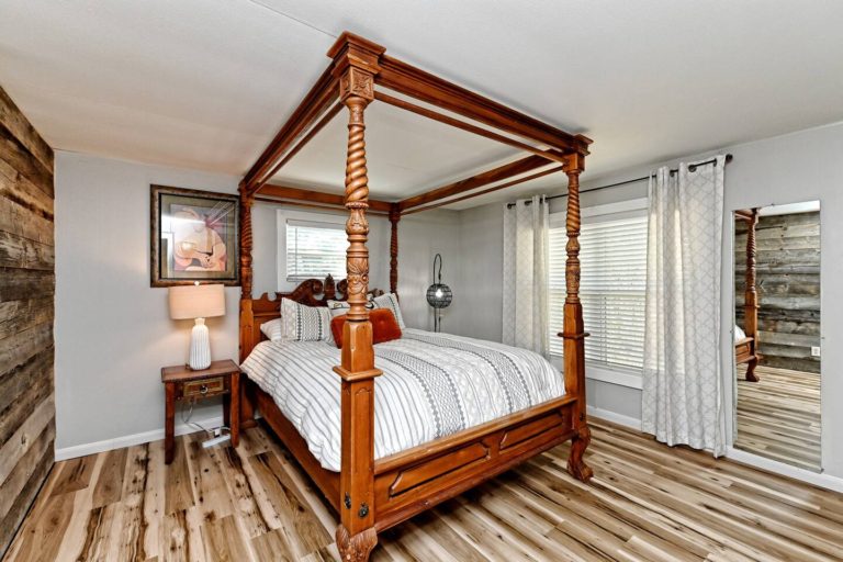 Bedroom two has a comfortable and one of a kind hand-carved teak Queen bed. Also, not pictured is a newly added 1/2 B adjoining to this room.