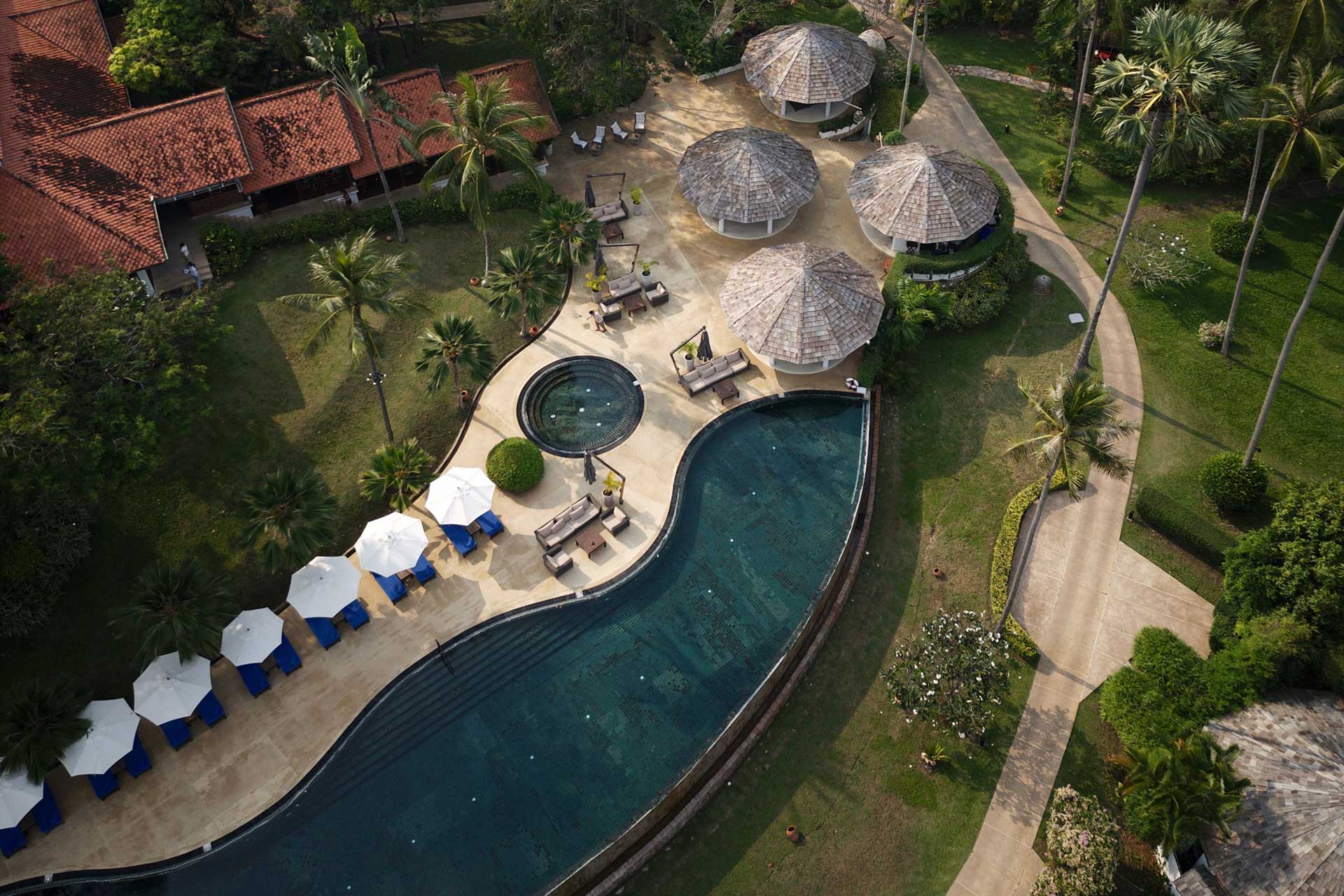 an-aerial-view-of-a-pristine-beach-with-several-lu-2023-07-17-23-41-00-utc.jpg