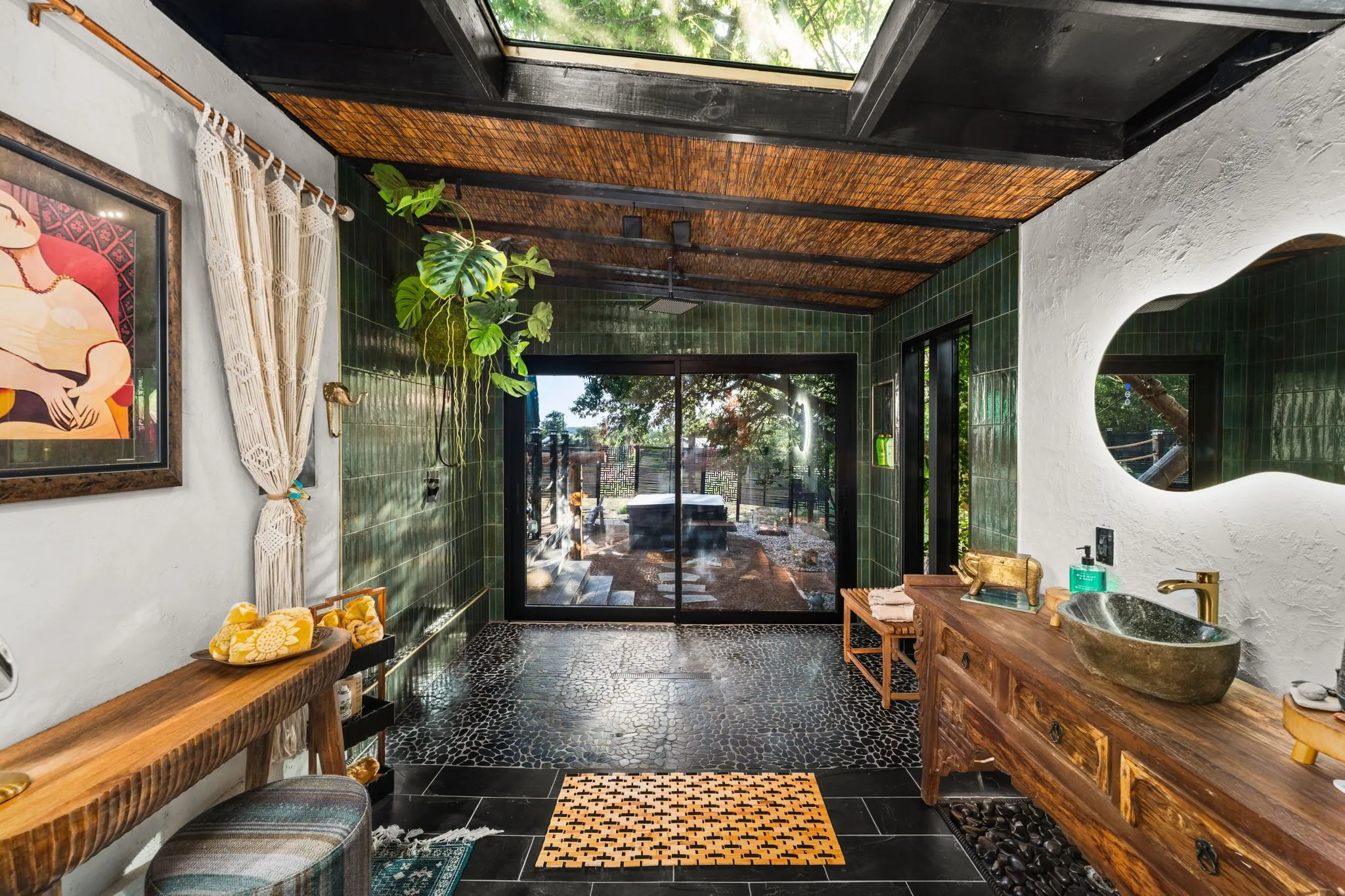 Luxury spa-style bathroom with skylight shower and rustic modern décor at Sabi Nights Yurt in Marble Falls Texas