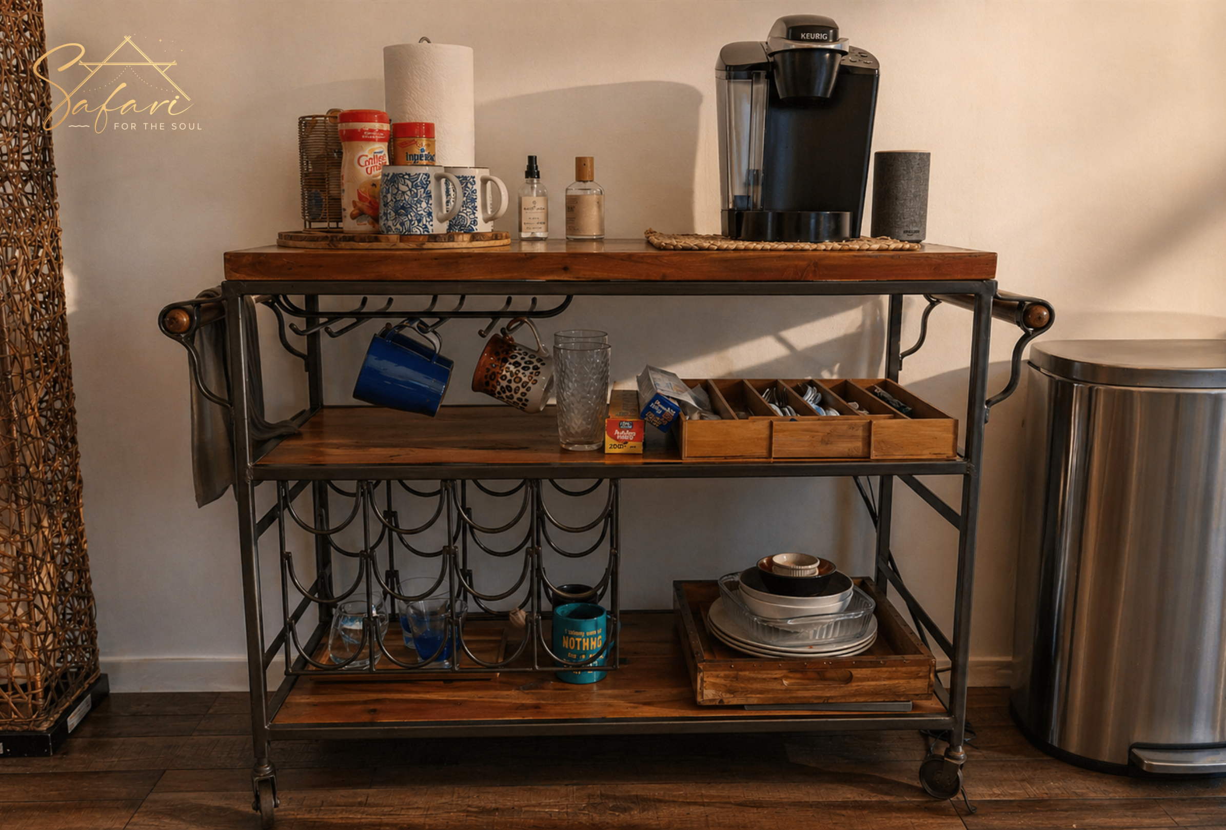 Coffee and snack station with mugs coffee machine and wooden shelf inside glamping tent in Spicewood Texas