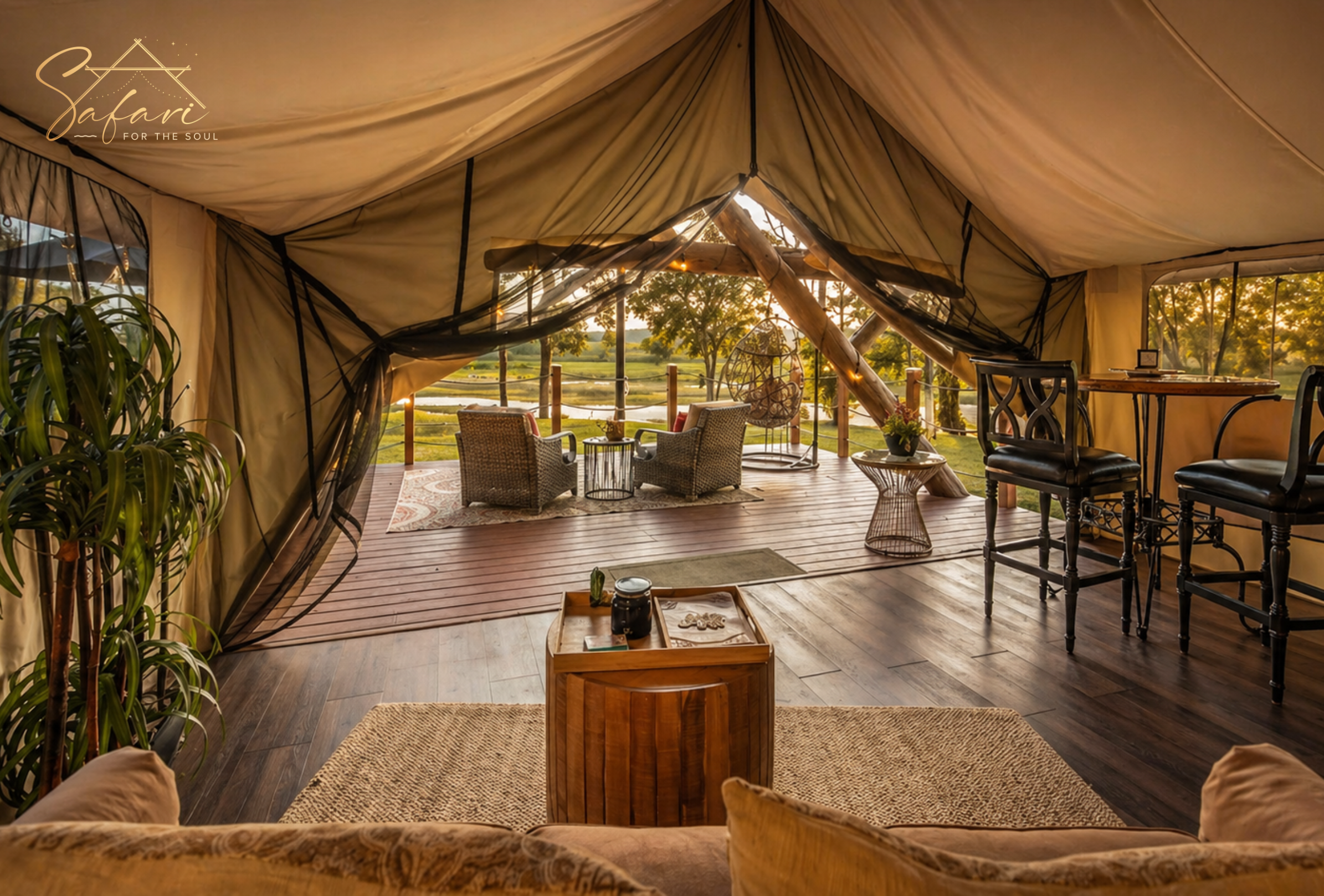 Spacious yurt interior with open seating and river view Marble Falls Texas