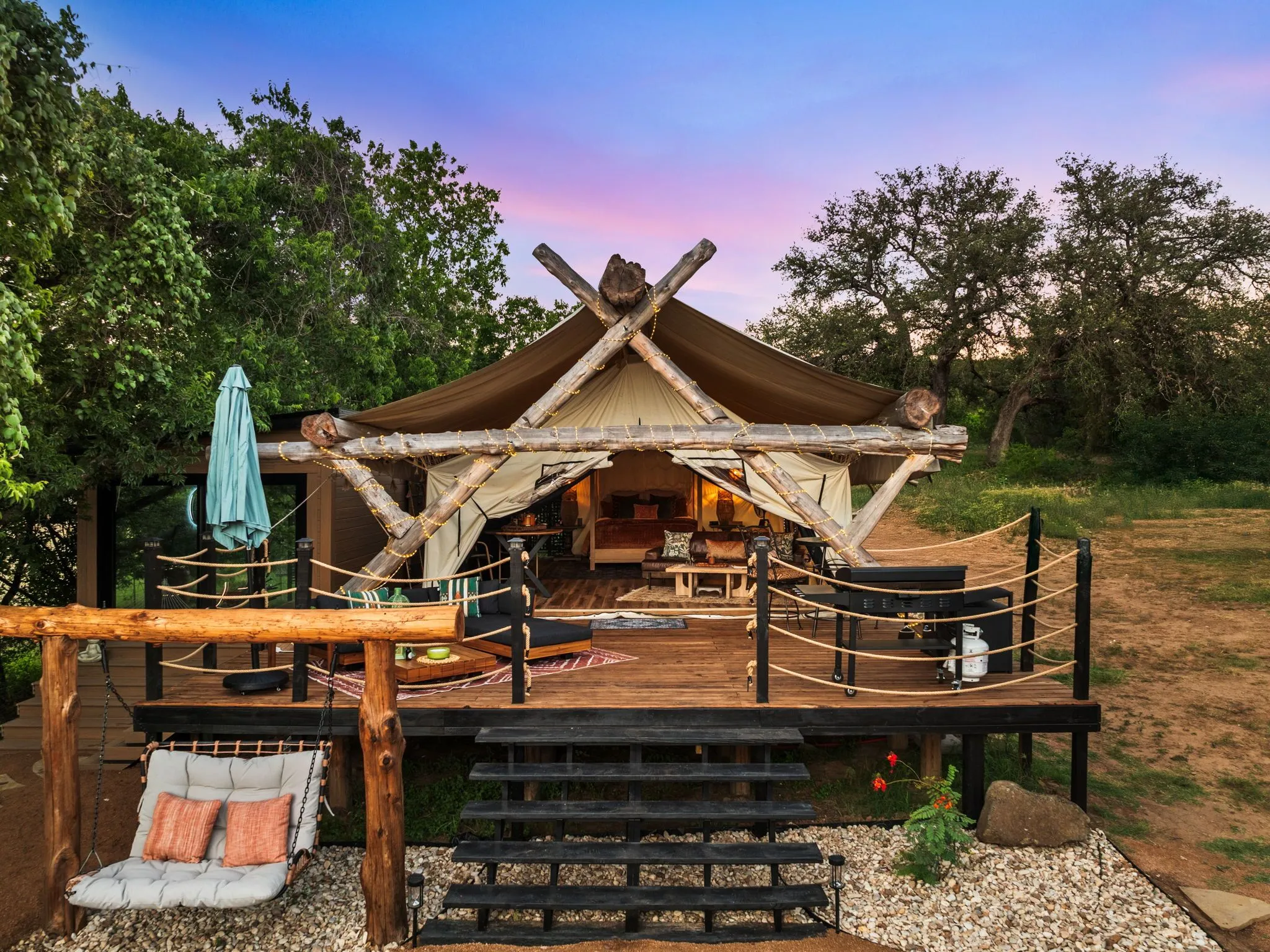 Luxury Sabi Nights Yurt glamping stay with spacious outdoor deck in Marble Falls Texas