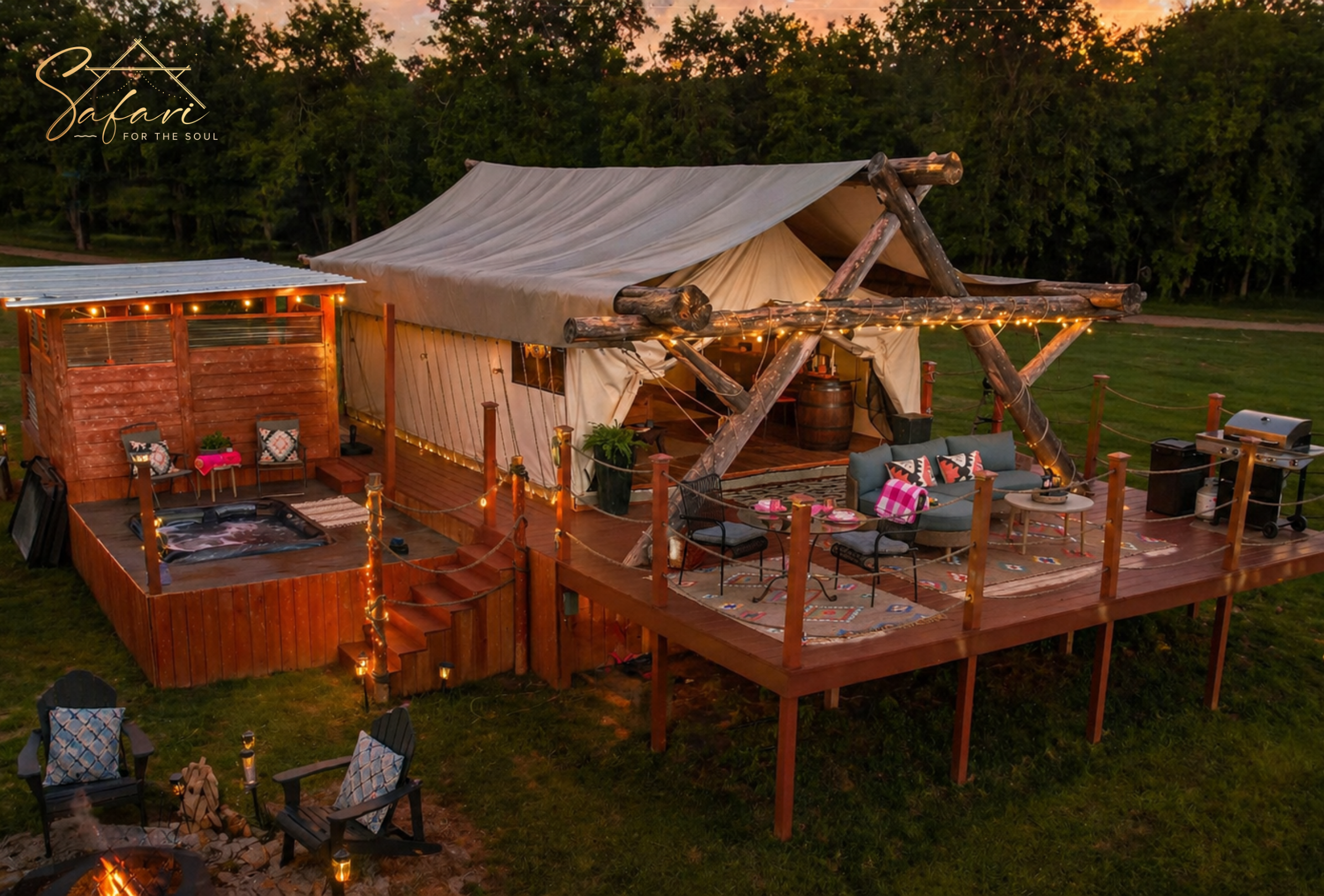 Luxury glamping tent with private deck hot tub and seating area in Marble Falls TX at dusk