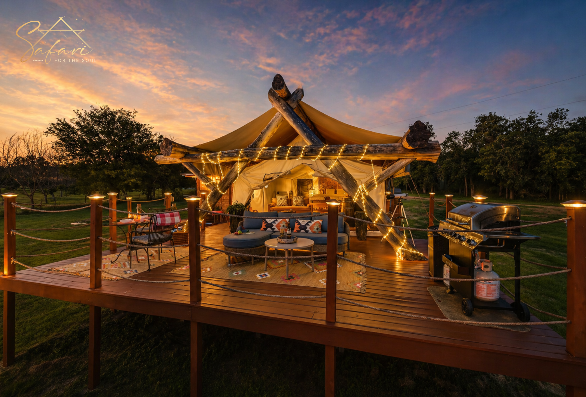 Luxury glamping tent illuminated with string lights at dusk in Marble Falls Texas