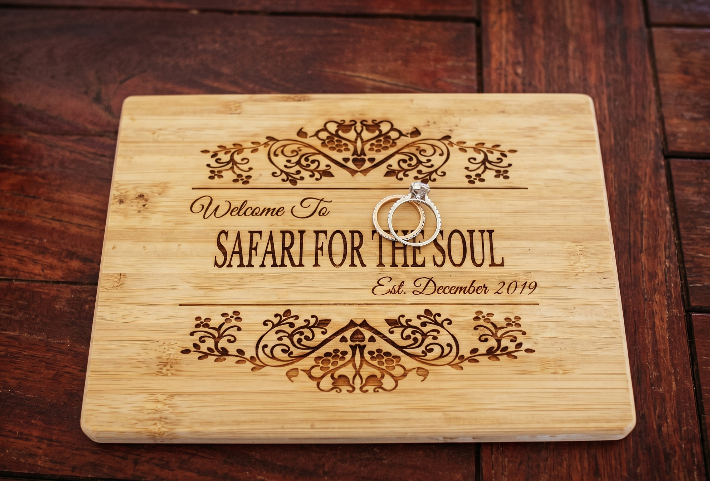 Wooden welcome board with engraved Safari for the Soul sign and rings Marble Falls TX